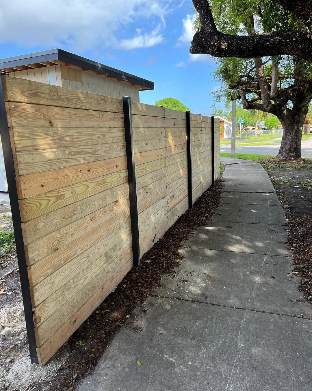 Horizontal wood fence street view